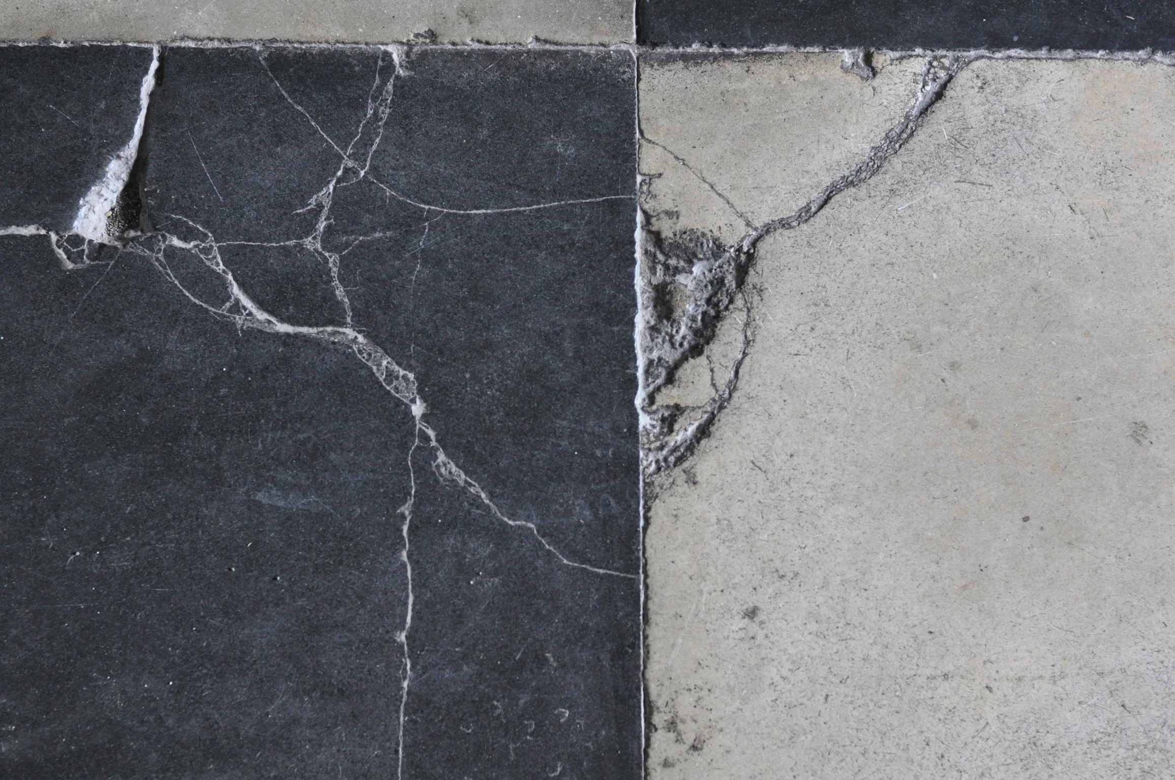 Cracked floor tiles in San Agustin Church, Intramuros, Manila Philippines