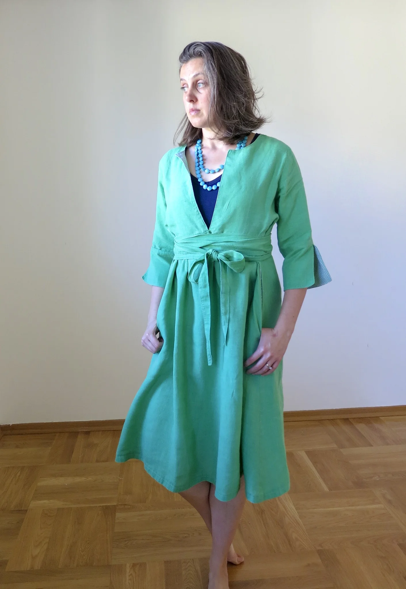 Green linen Schoolhouse Tunic Dress hack, front view