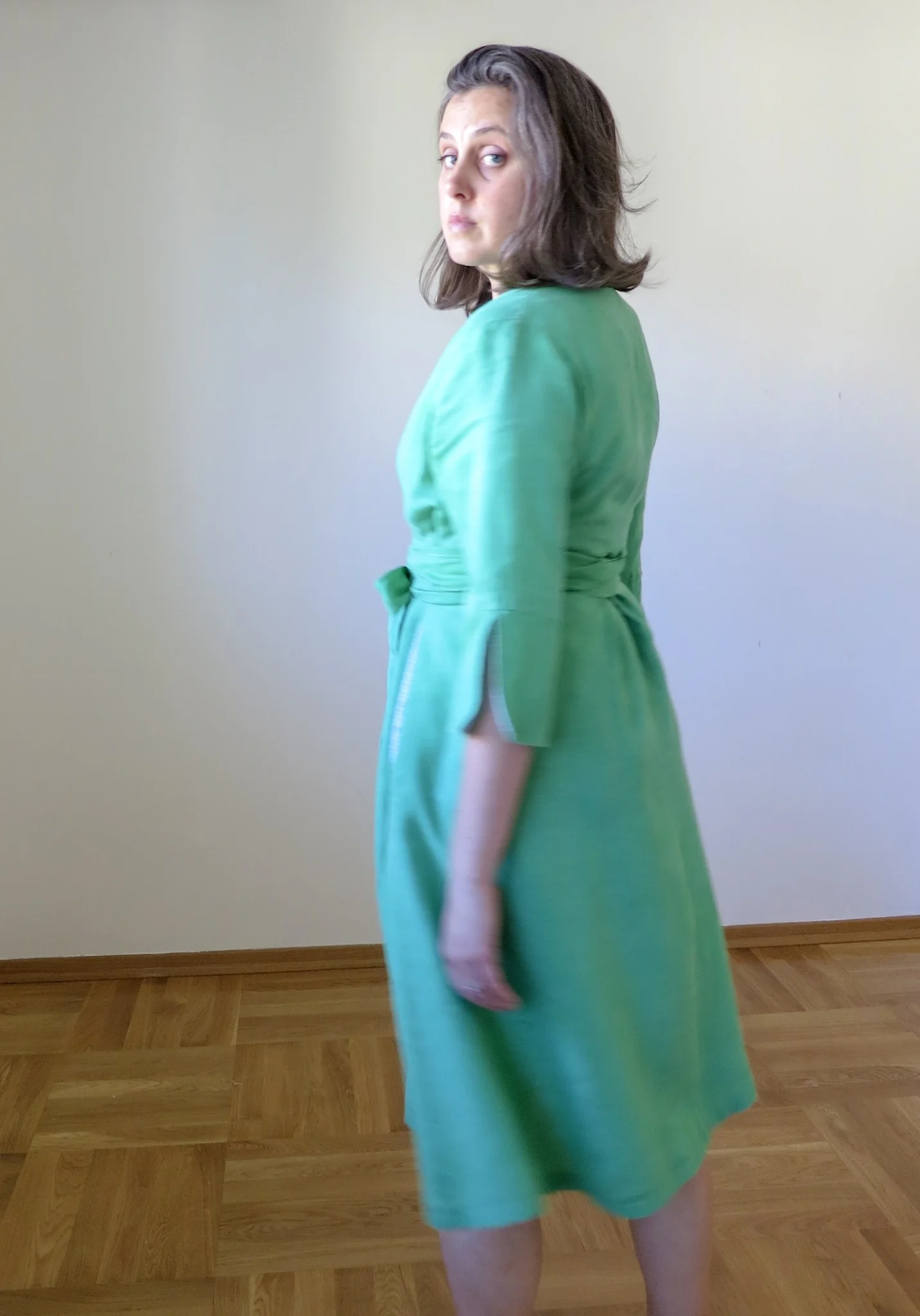 Green linen Schoolhouse Tunic Dress hack, back view