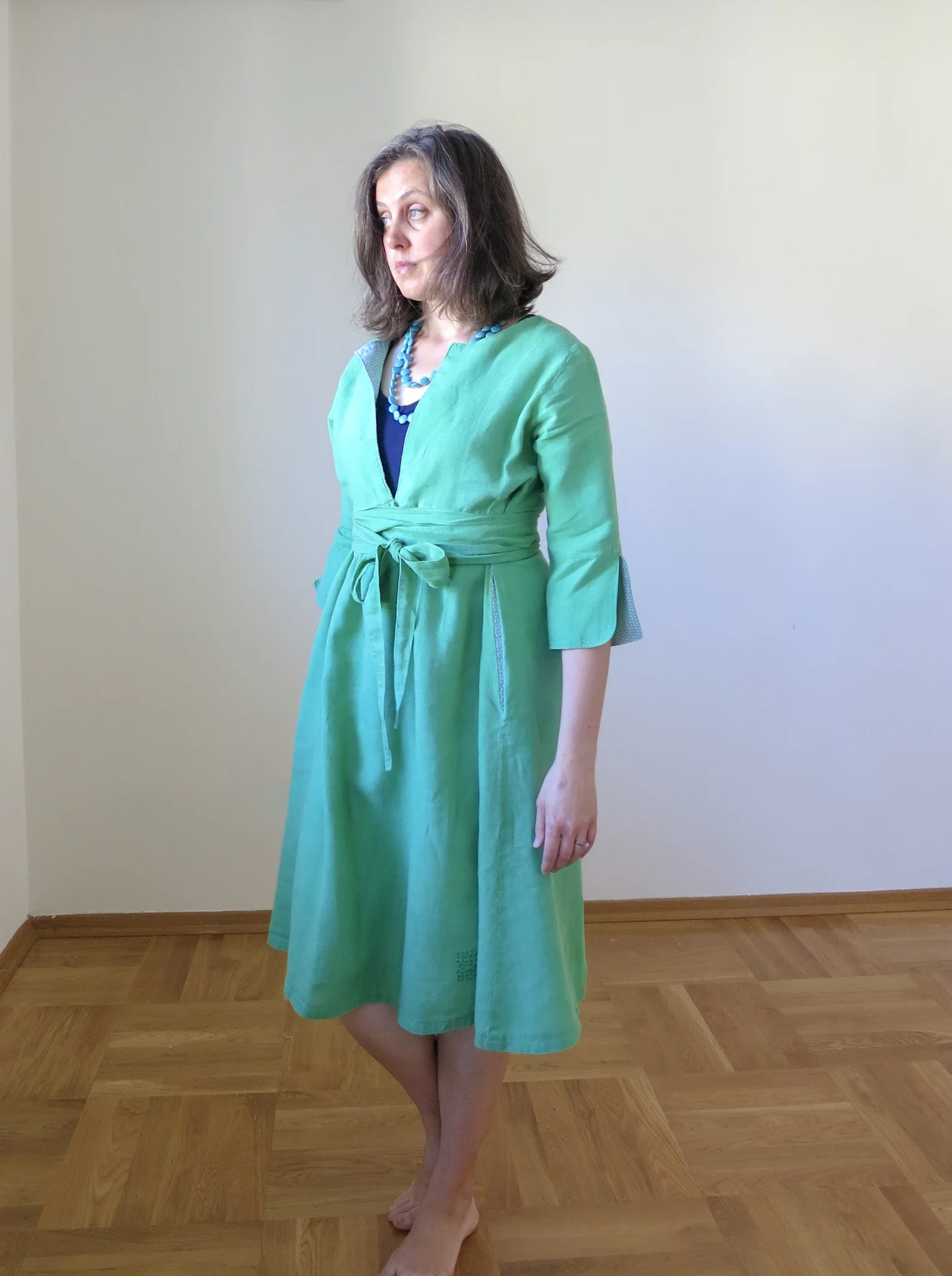 Green linen Schoolhouse Tunic Dress hack, front view