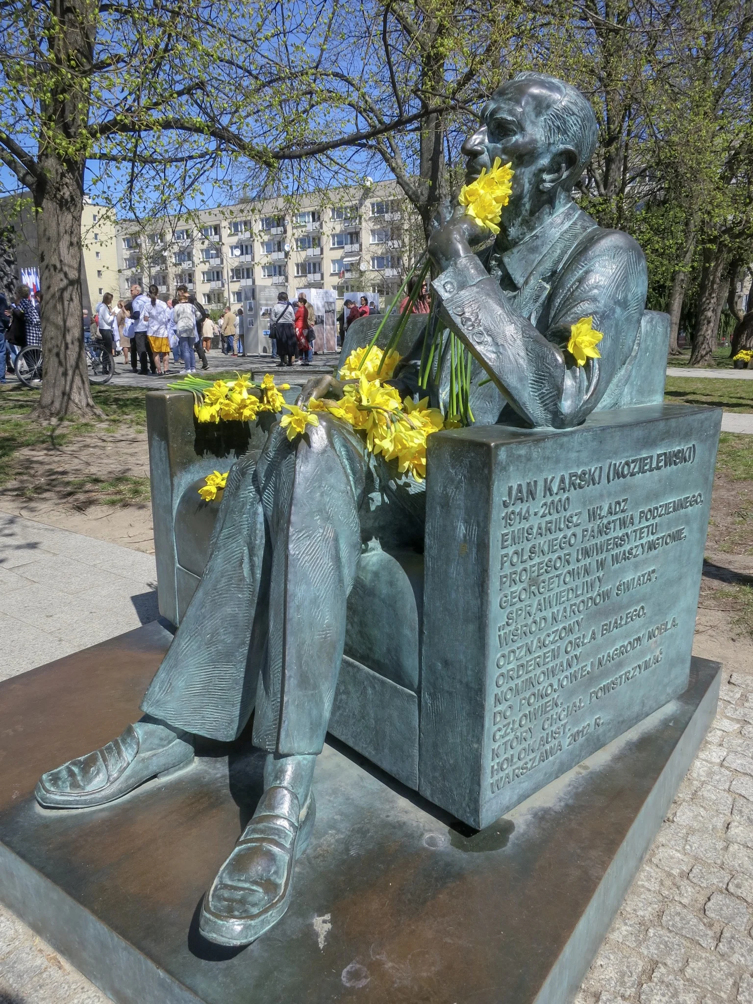 Daffodils are strewn on the statue of Jan Karski in commemoration of the 76th Anniversary of the Warsaw Ghetto Uprising