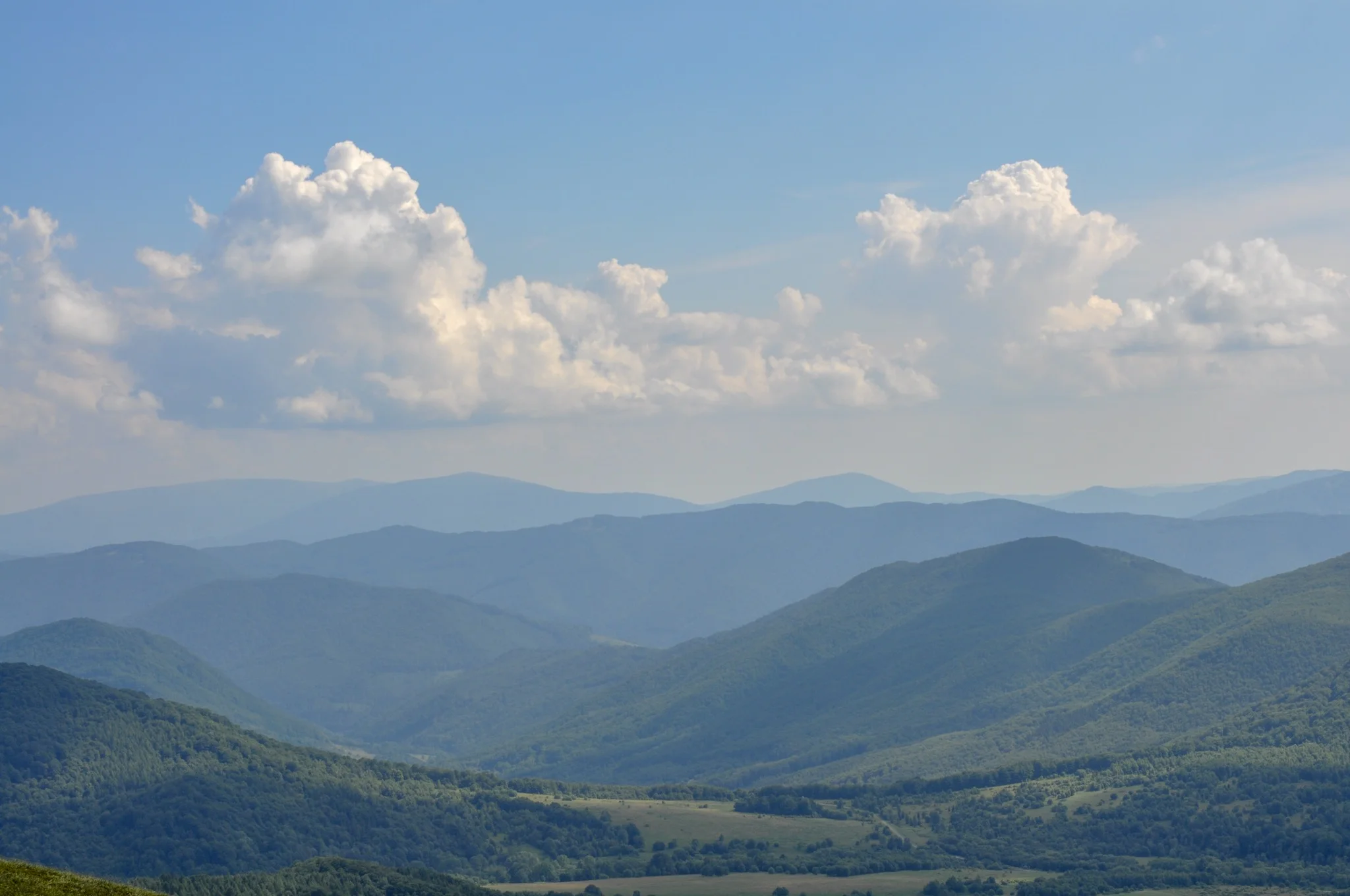Green and blue mountain ranges in the Bieszczady National Park