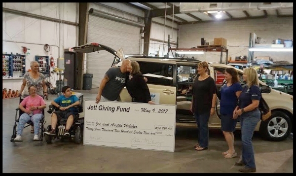Austin and Joe Wilcher receive the keys to their new van!