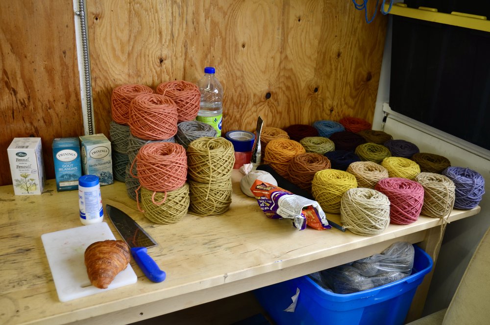 Cakes of naturally dyed yarn