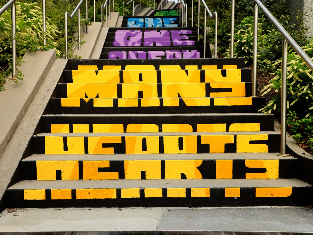  Image crediting: Michael Talbot &amp; Phoebe Warner,  Collective Ascension , 2023. Site-specific mural. Brian P. Murphy Memorial Staircase, Cambridge, MA. Project executed in collaboration with Community Art Center and facilitated by art_works for D