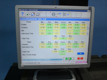 The vehicle is registered on the system to establish manufacturer recommended alignment settings