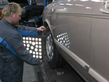 Alignment targets are fixed in position on the wheels