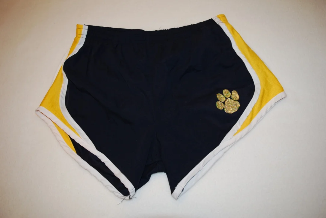 Cheer shorts with gold glitter paw