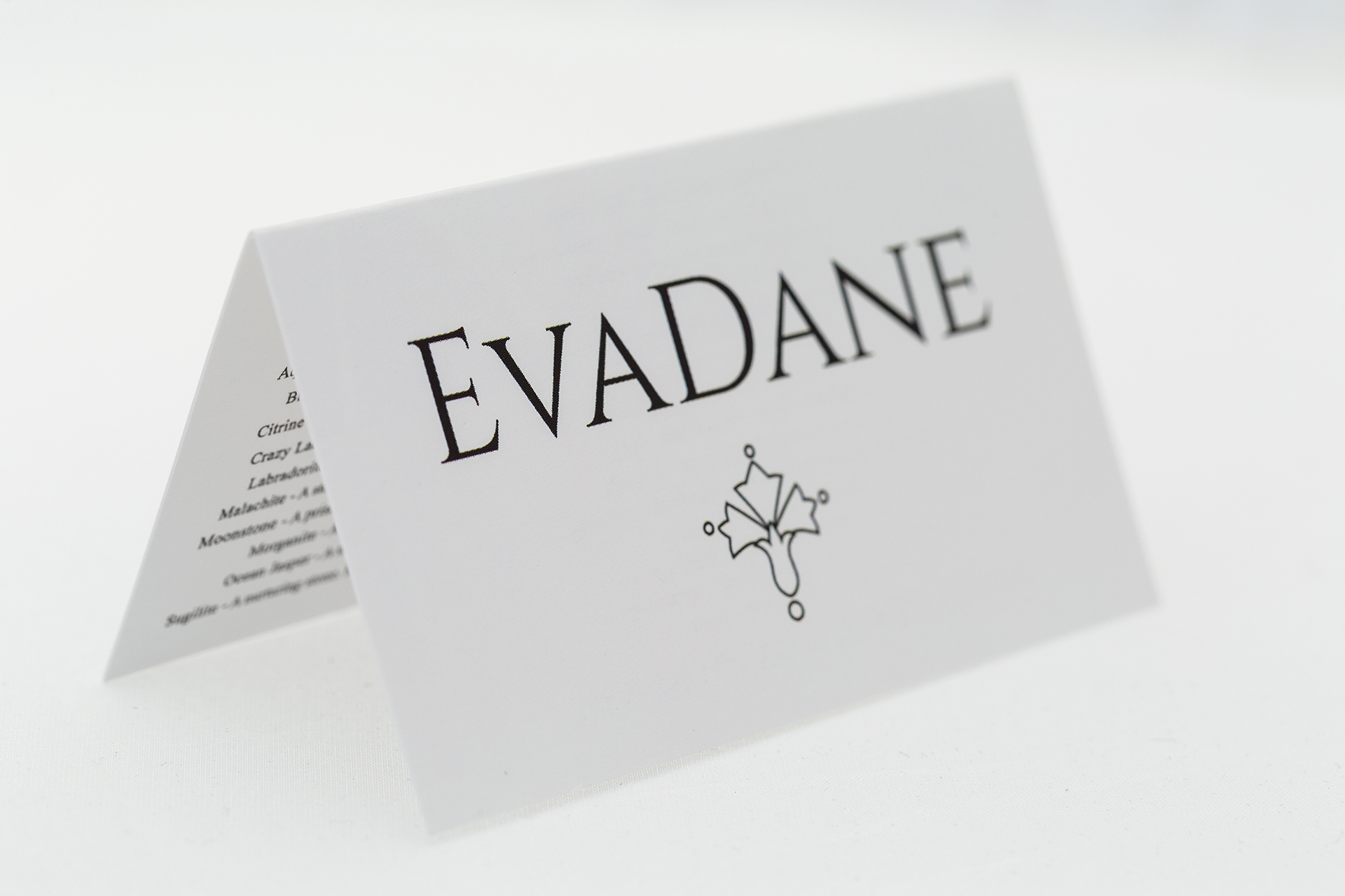 EvaDane Natural Hematite Gemstone Rope Bead Hamsa Charm Stretch Bracelet