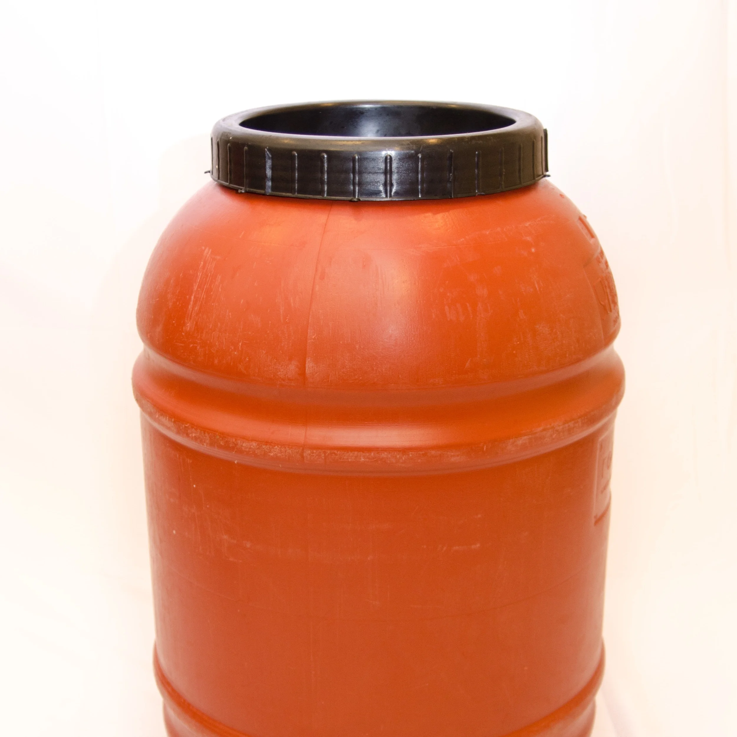 Item # 1003 - USED 50 Gal Red Poly Screw Top