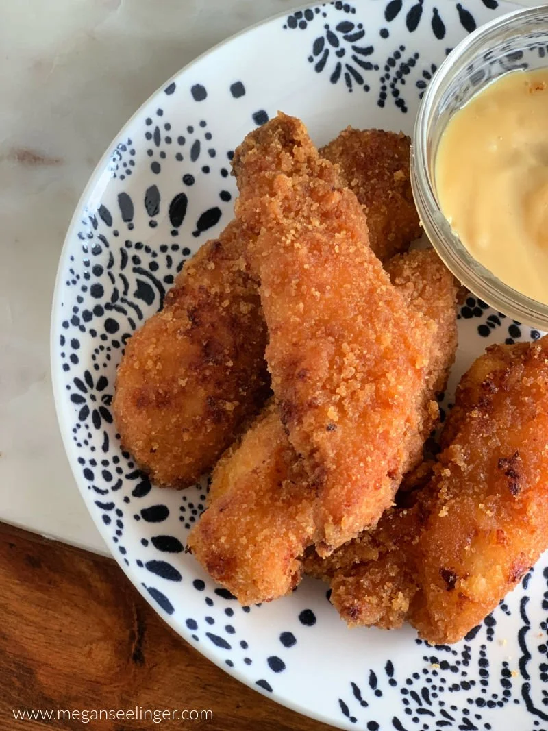 Keto fried chicken tenders with almond flour pork panko coating and copycat Chick-Fil-A sauce