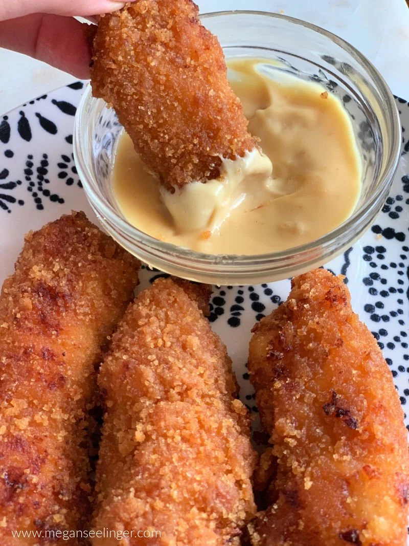 Keto fried chicken tenders with almond flour pork panko coating and copycat Chick-Fil-A sauce