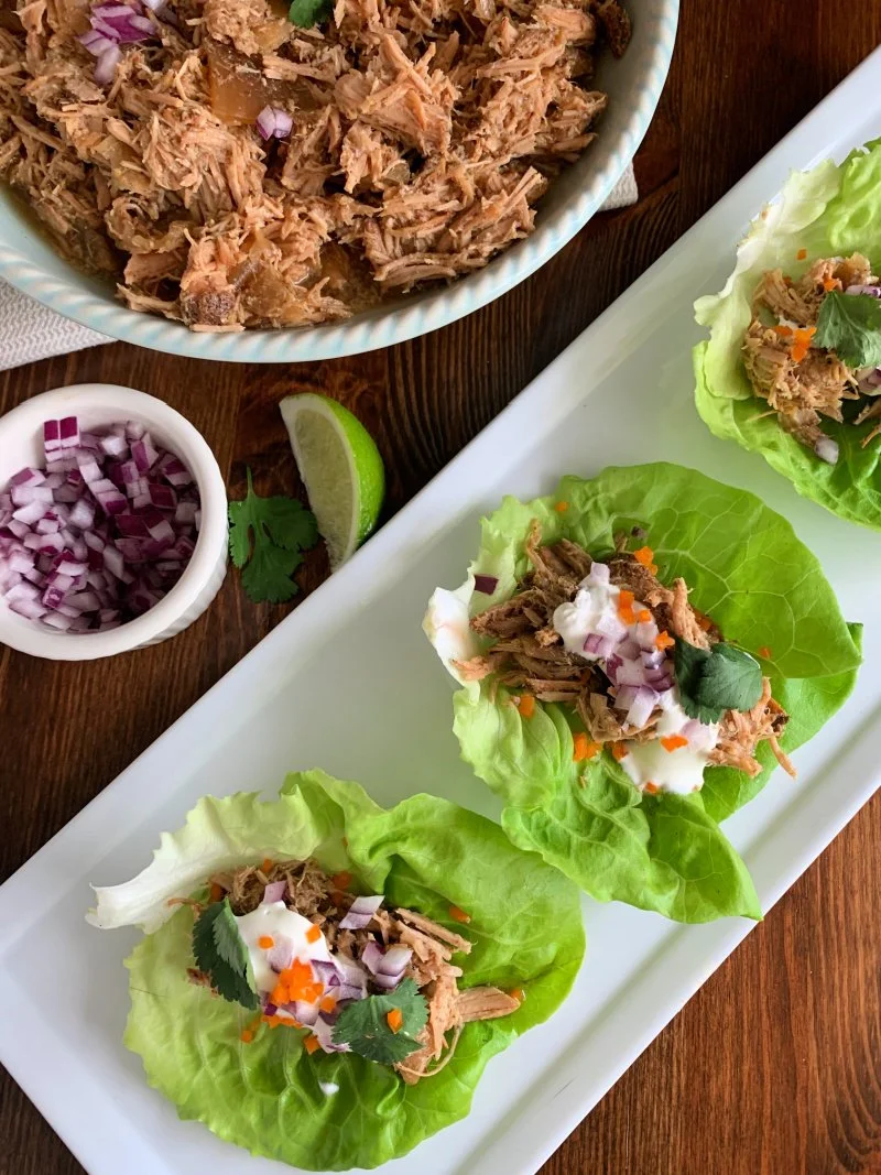 Crockpot pork carnitas made for easy meal prep. This high protein, low carb recipe is perfect for lettuce wraps or bowls and busy weeknights.