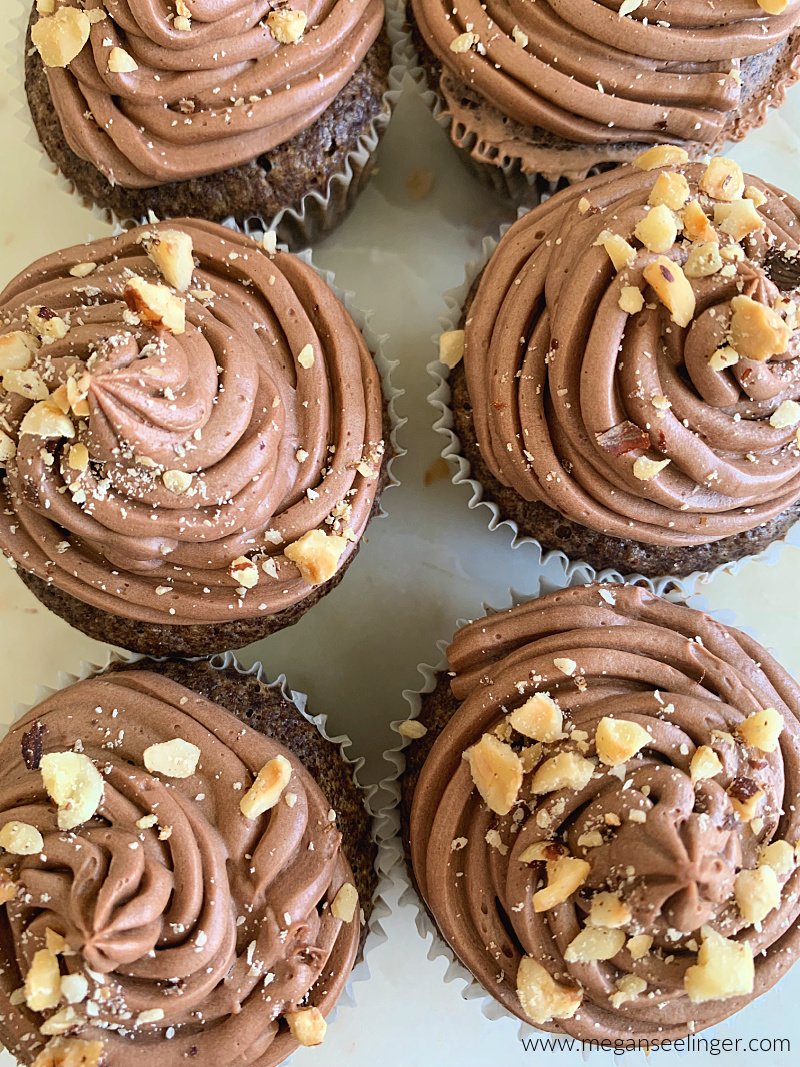 These low carb chocolate cupcakes are rich, moist, gluten free, and topped with creamy chocolate hazelnut frosting. Made with coconut flour, sugar free ingredients, they’re the perfect keto chocolate dessert