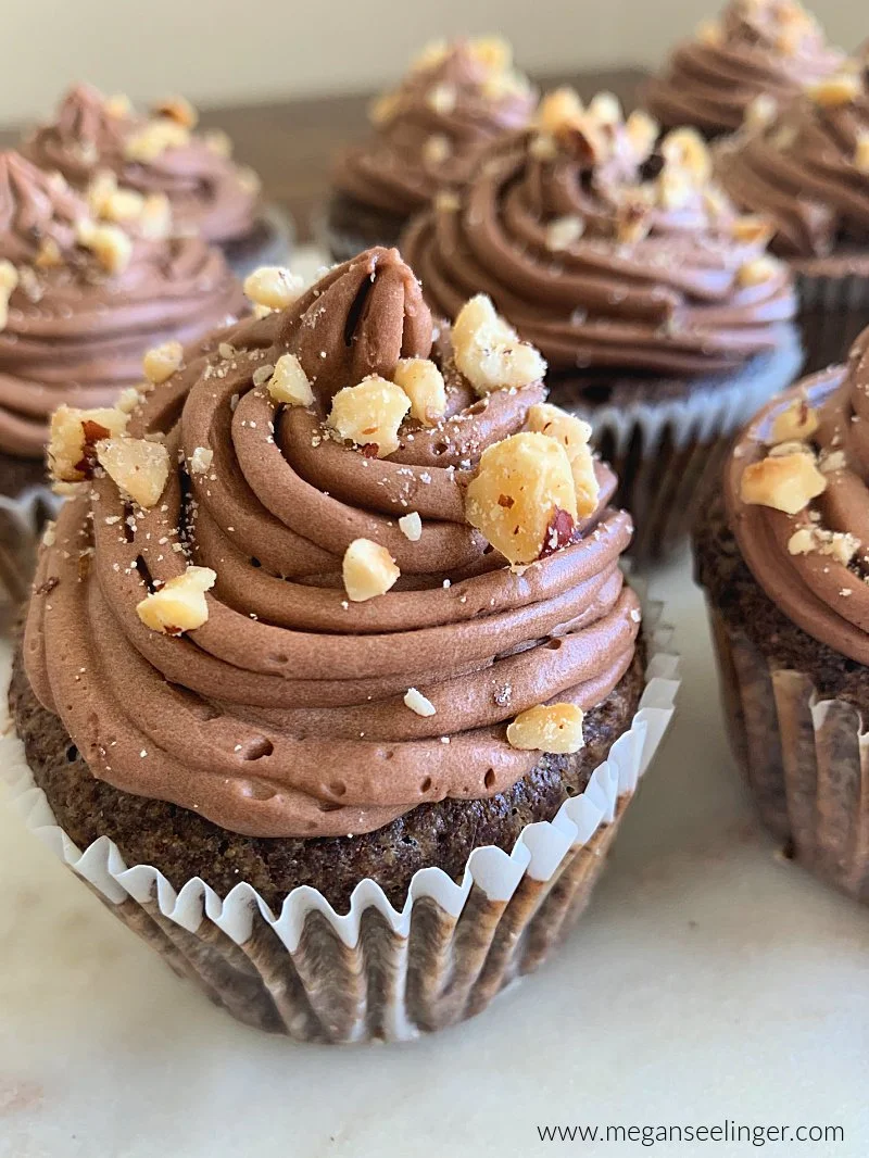 These low carb chocolate cupcakes are rich, moist, gluten free, and topped with creamy chocolate hazelnut frosting. Made with coconut flour, sugar free ingredients, they’re the perfect keto chocolate dessert
