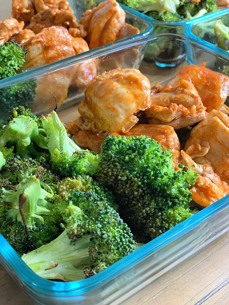 Easy buffalo chicken sheet pan dinner with a sugar free sauce. High protein, low carb, and perfect for meal prep or quick healthy meals.
