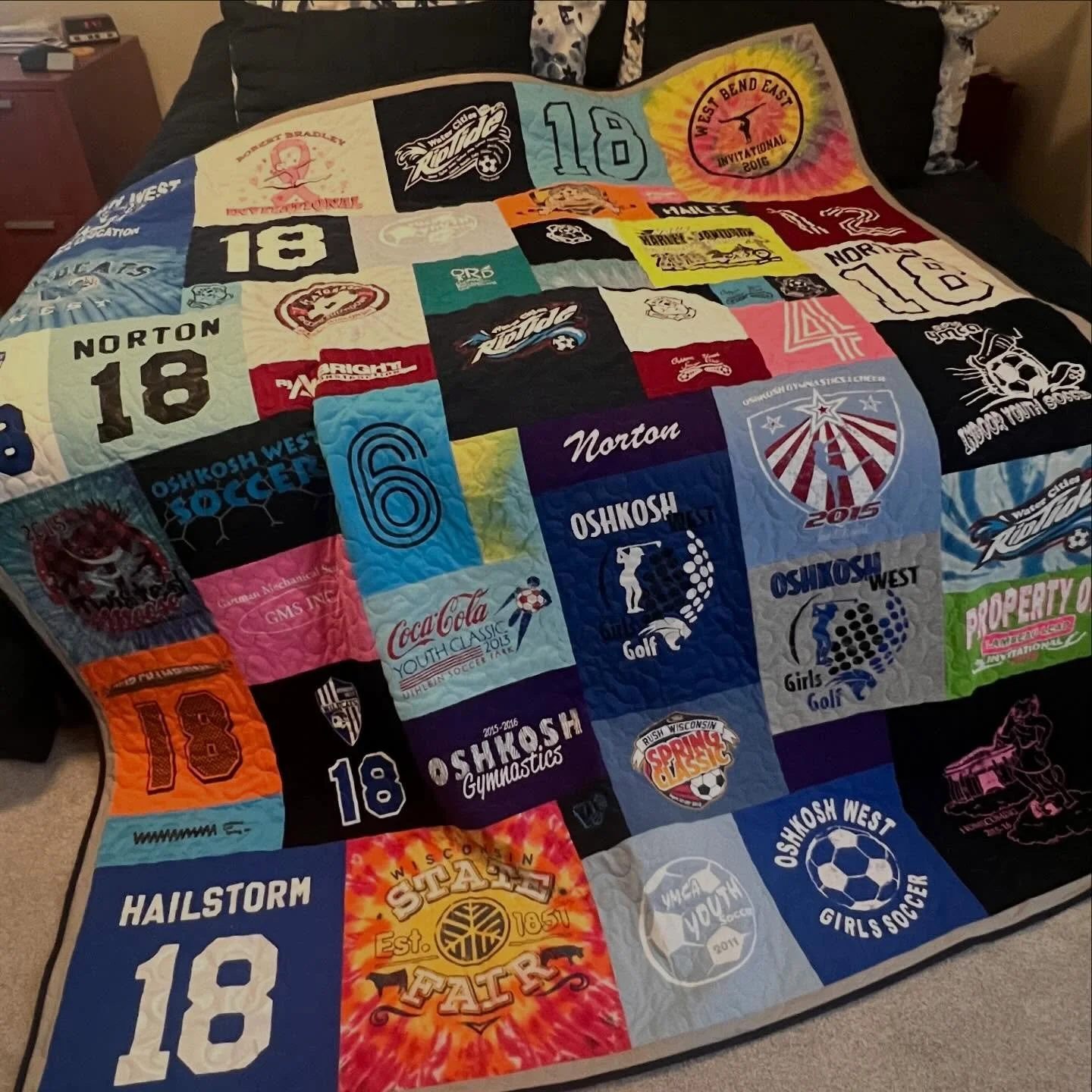 And now for something other than cookies! I had fun making a tshirt quilt lately too! I really like doing the collage style of tshirt quilts over the traditional squares. 

Quilted by @angiebrandlhandmade