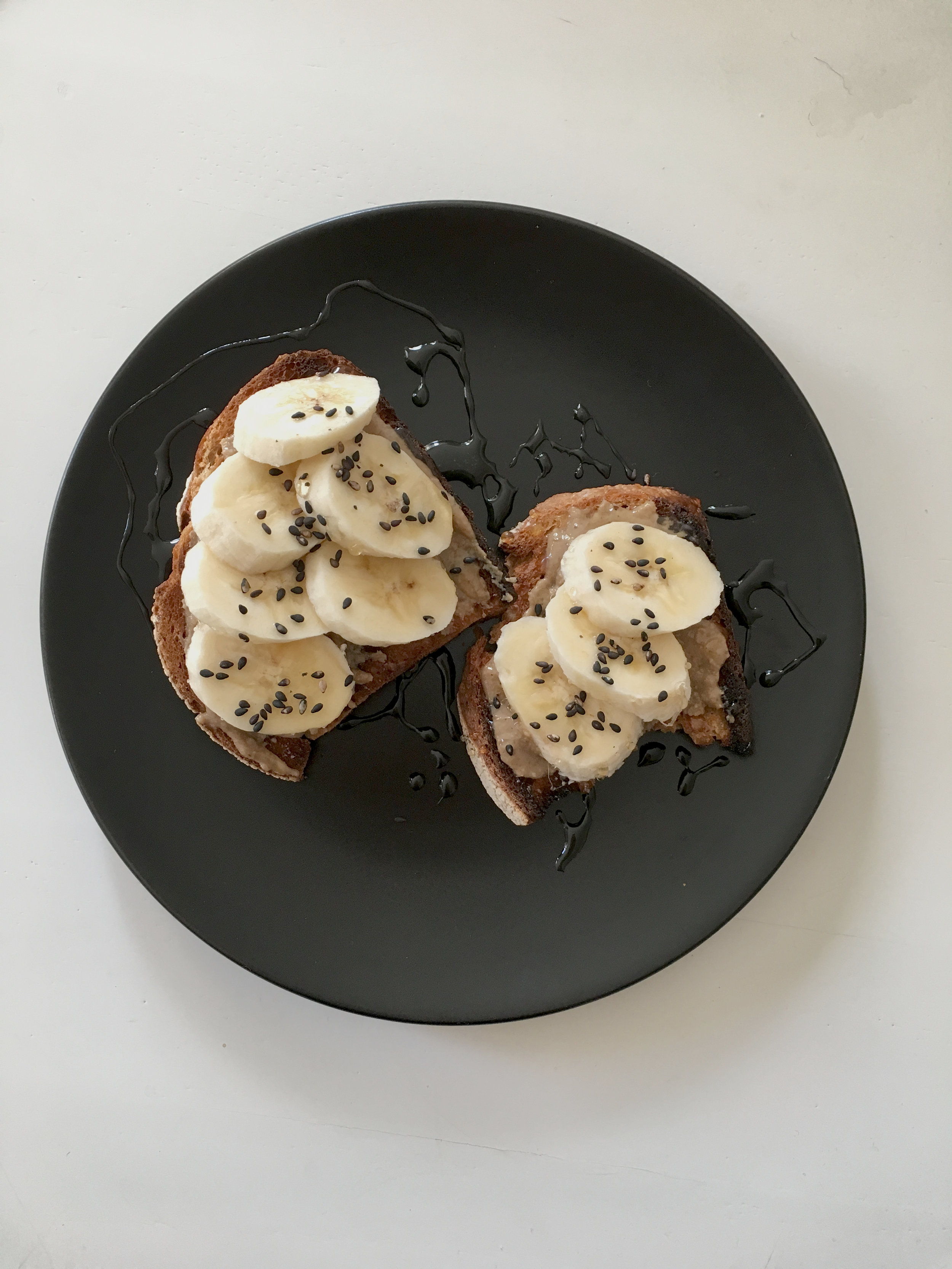 Sourdough toast with banana, tahini, honey, sesame 