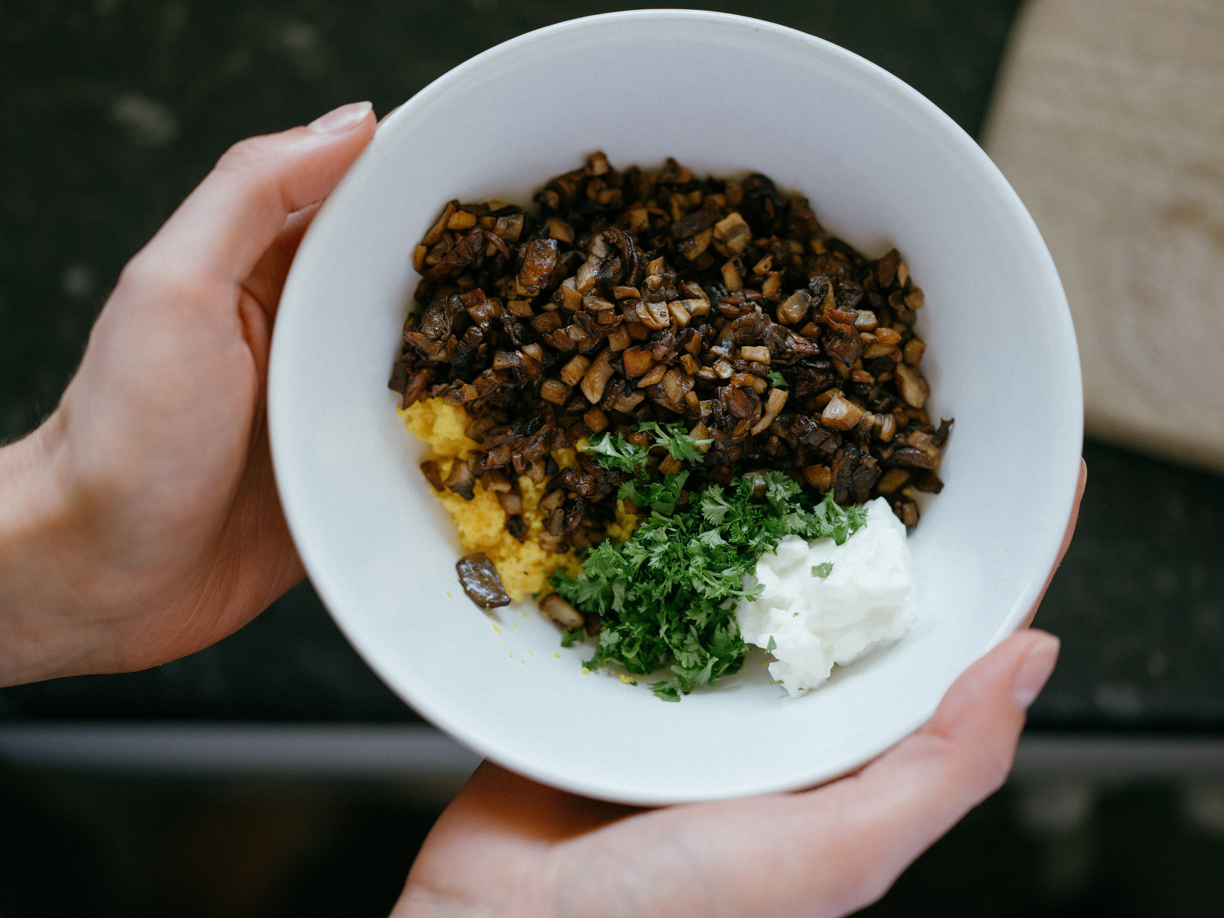 Mushrooms, yolks, fresh parsley and yoghurt. All of this is going inside those egg whites.