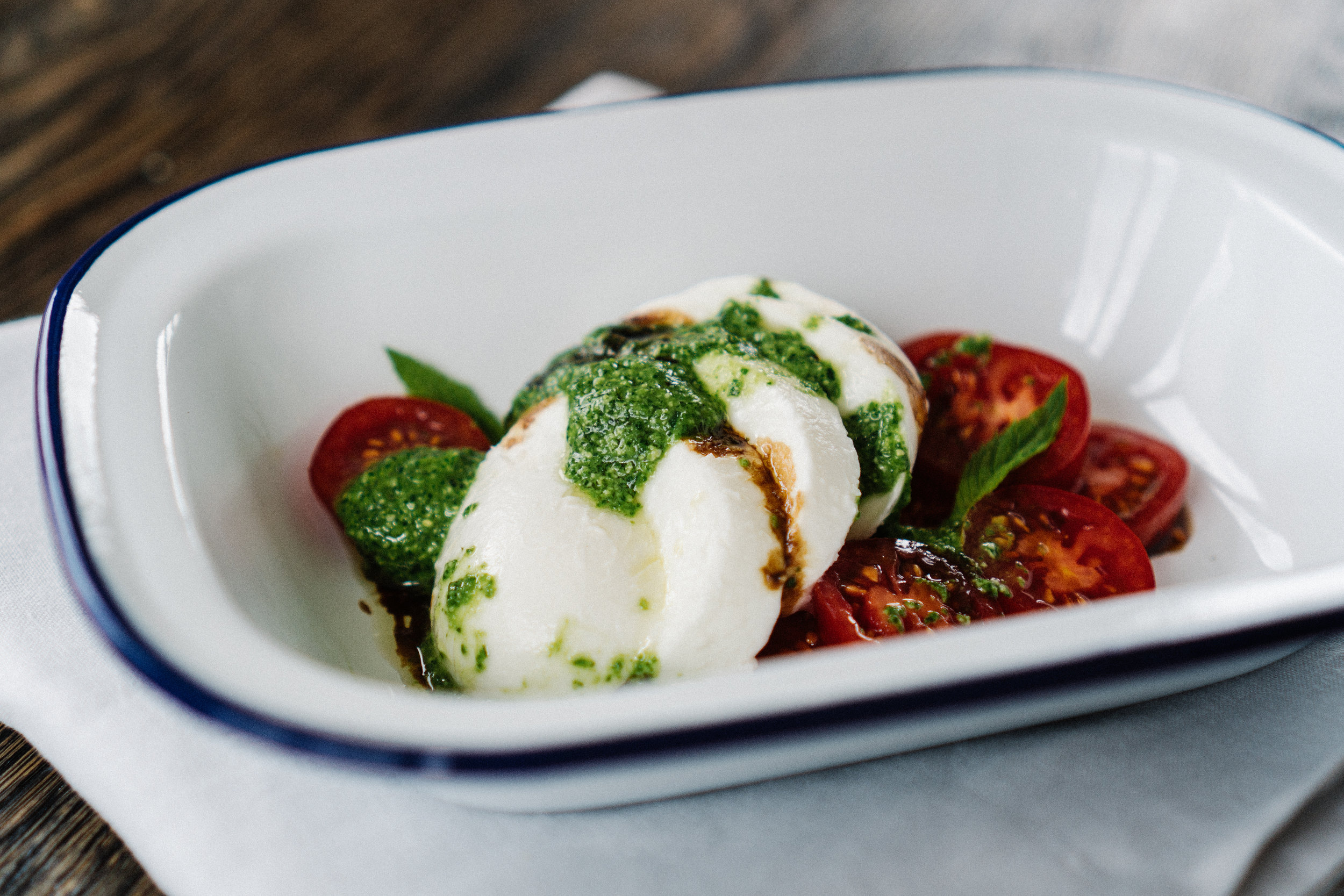 Just trying to inspire here: fresh mozzarella, tomatoes, a drizzle of balsamic and homemade rocket pesto.