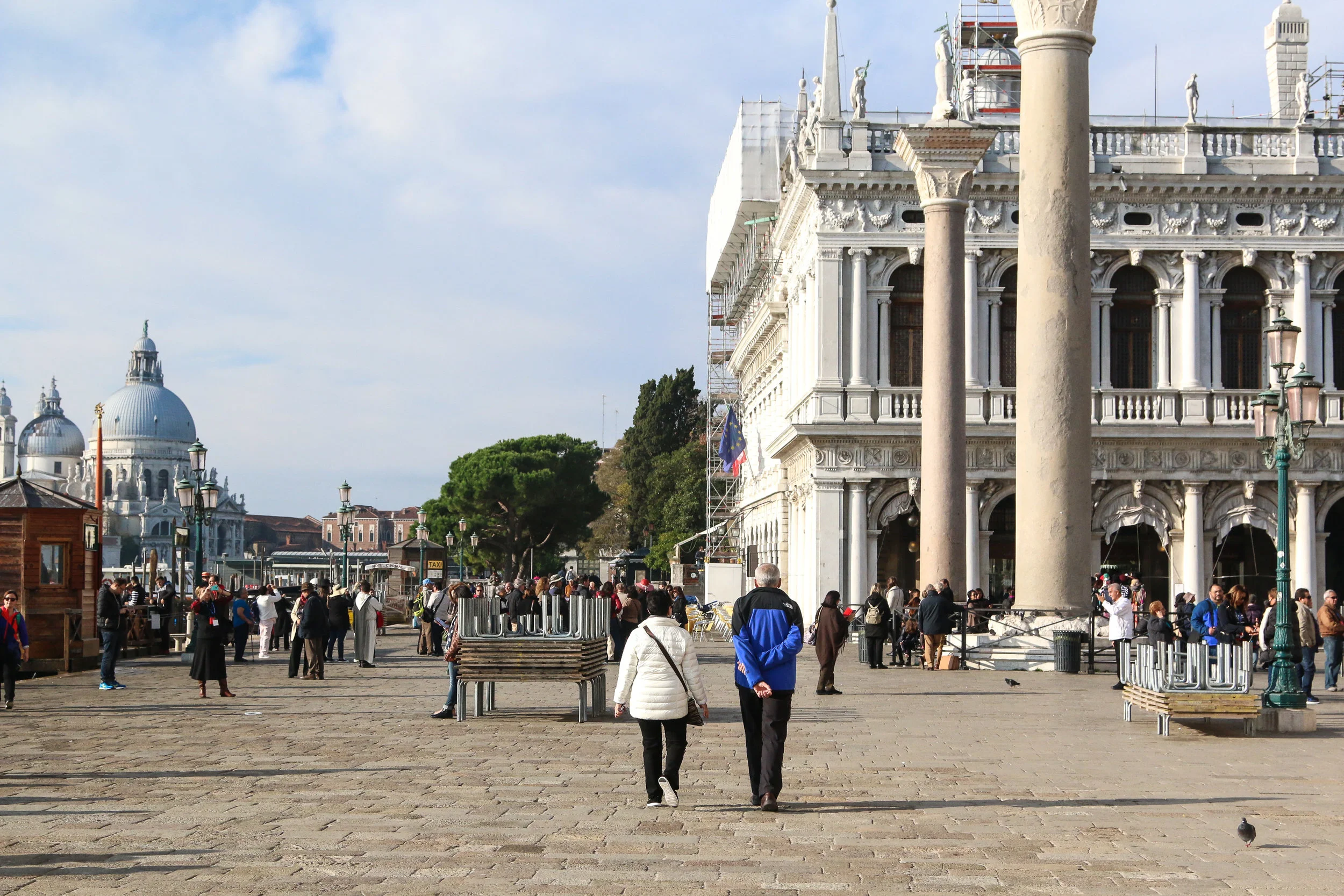 Walking by the columns of Piazza San Marco