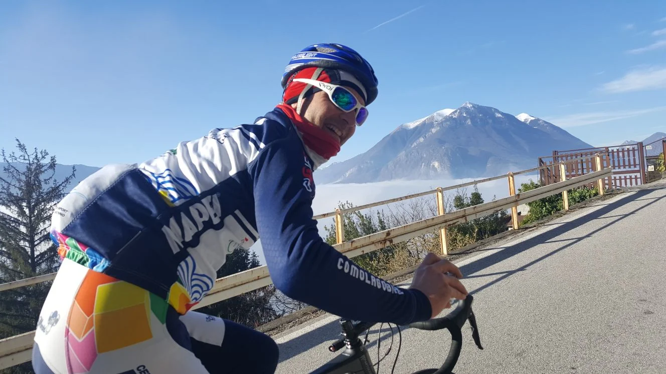 ComoLagoBike founder and President, Luca Molteni, riding above the clouds.