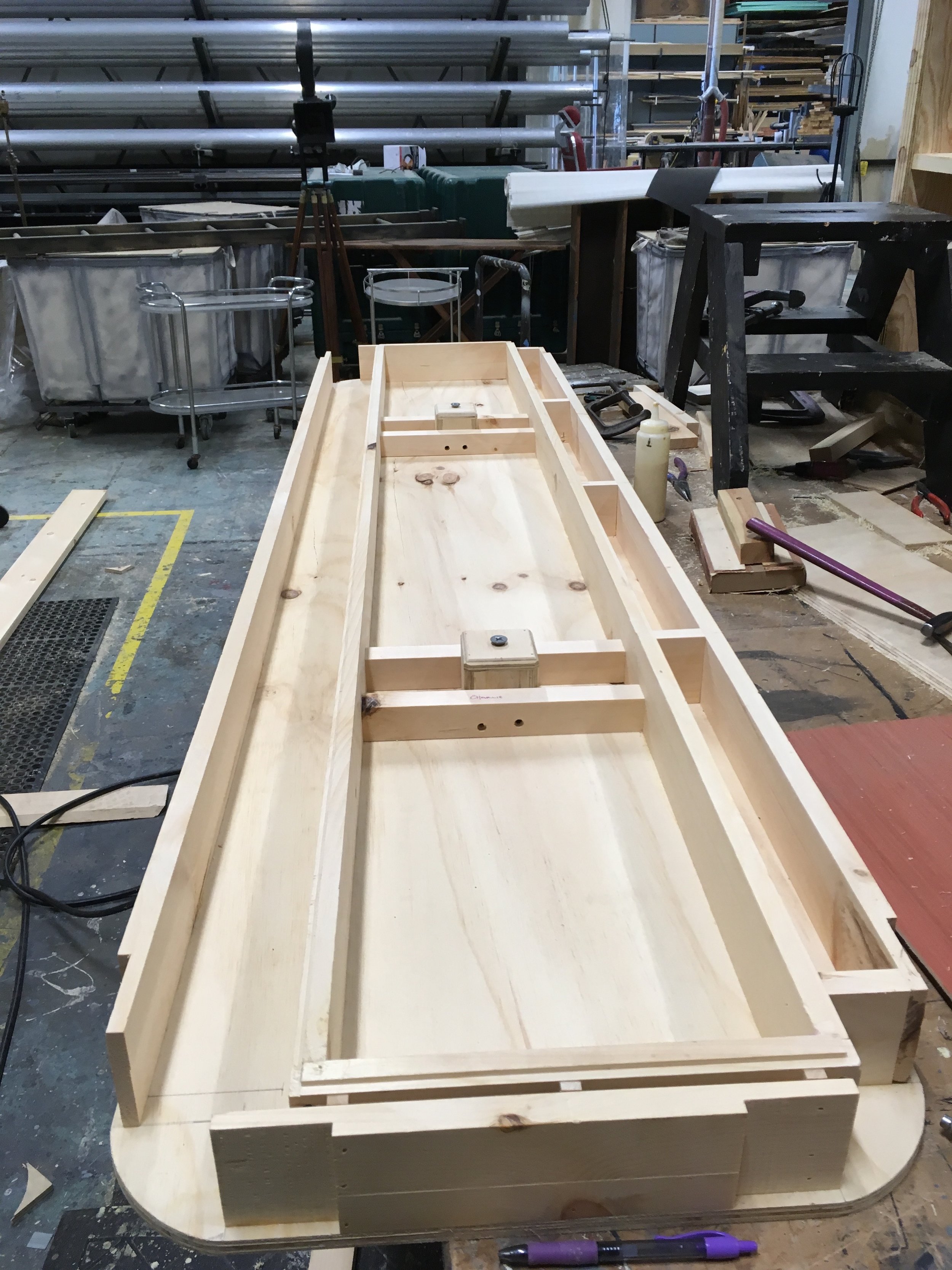 Here you can see the skeleton of the counter top engineering. The pegs here would slot into the holes in the above photo and be tightened with a stove bolt that lay flush to the underside of the counter once attached.