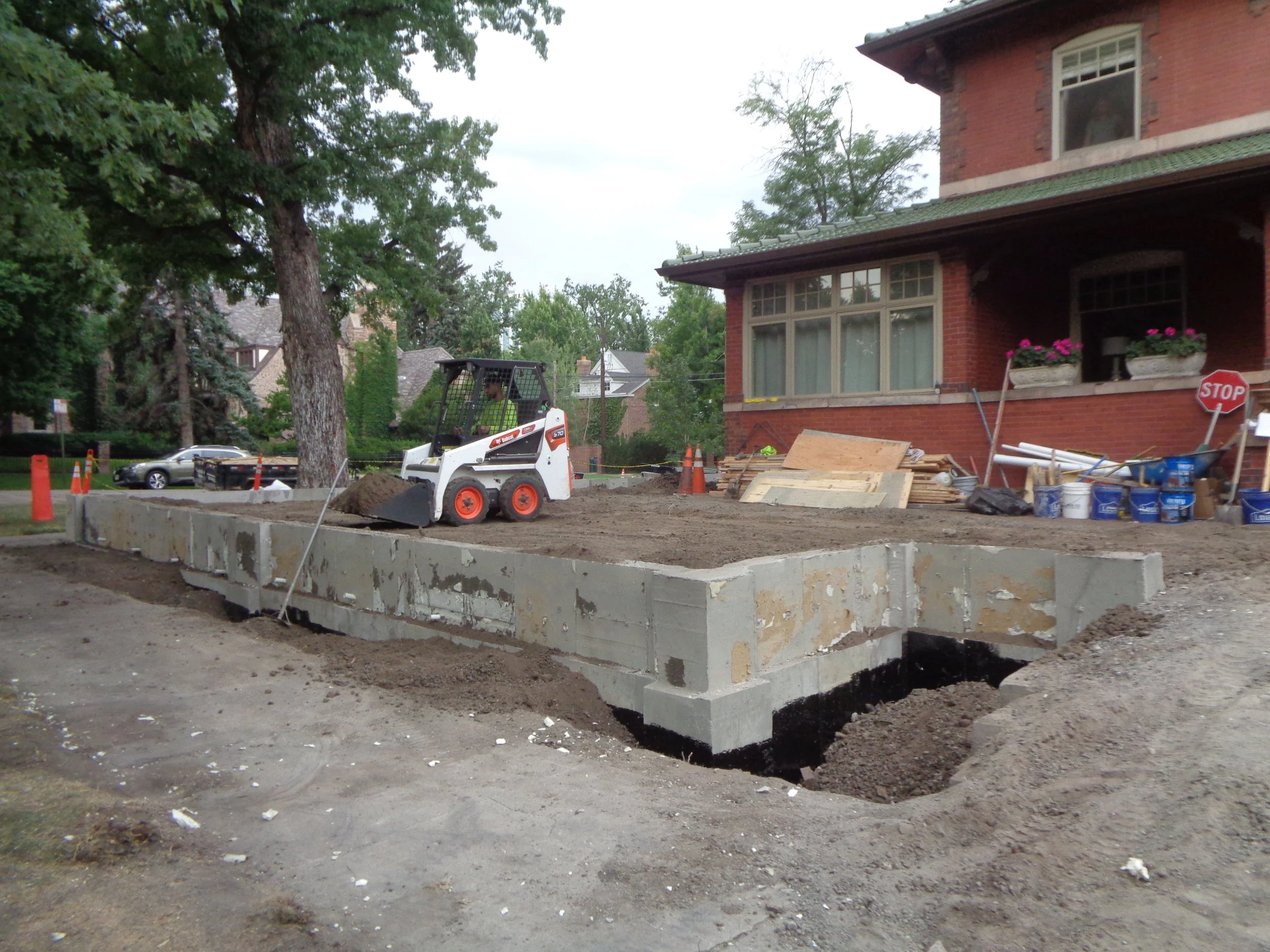 FINISHED POUR, BACKFILL UNDERWAY.JPG