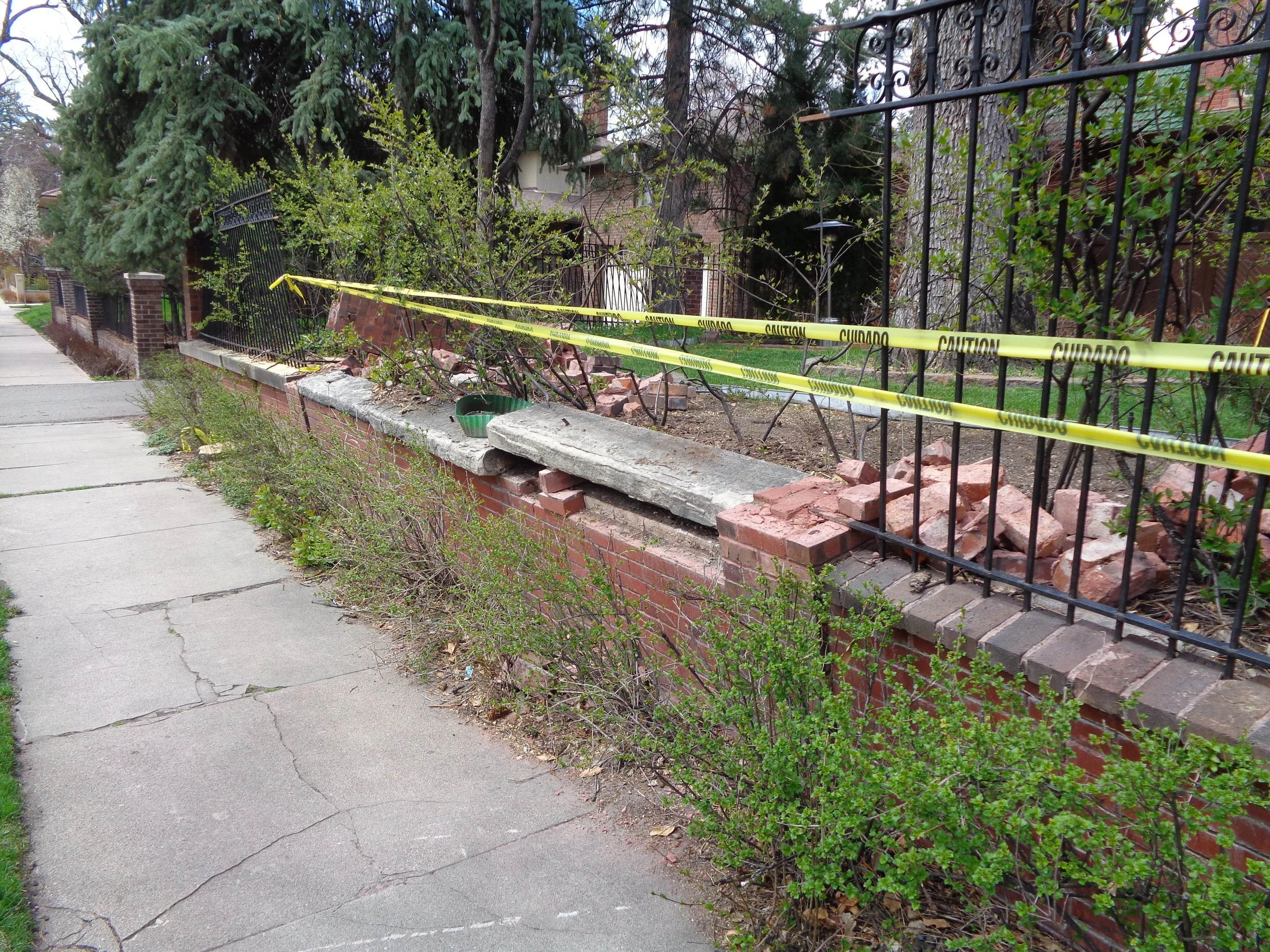 BEFORE DAMAGED LEANING RETAINING WALL.JPG