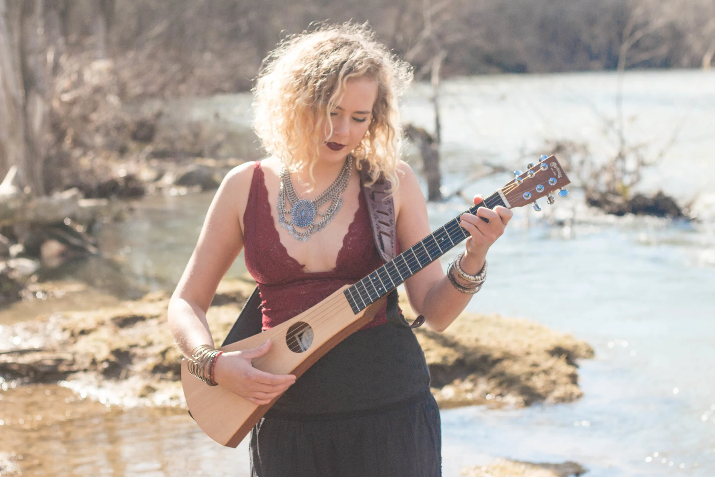 river rat pretends to know how to use that instrument, wistfully