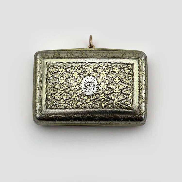 Georgian sterling silver vinaigrette with hinged lid for sponge, gilt interior, with ring for chatelaine, London 1813 maker TP/EP/JP, the top inscribed with initials EDF. Size: 1 ½ h x 1 w in