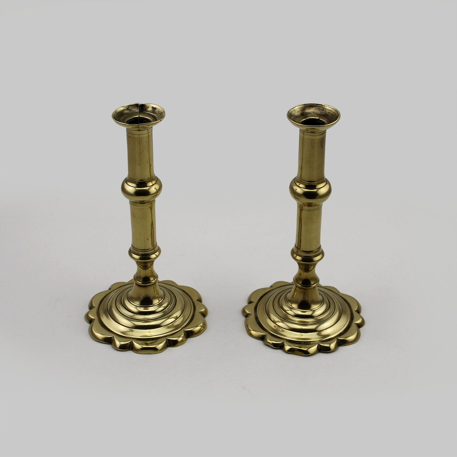 Pair of George II Brass Candlesticks — Uno Langmann Limited