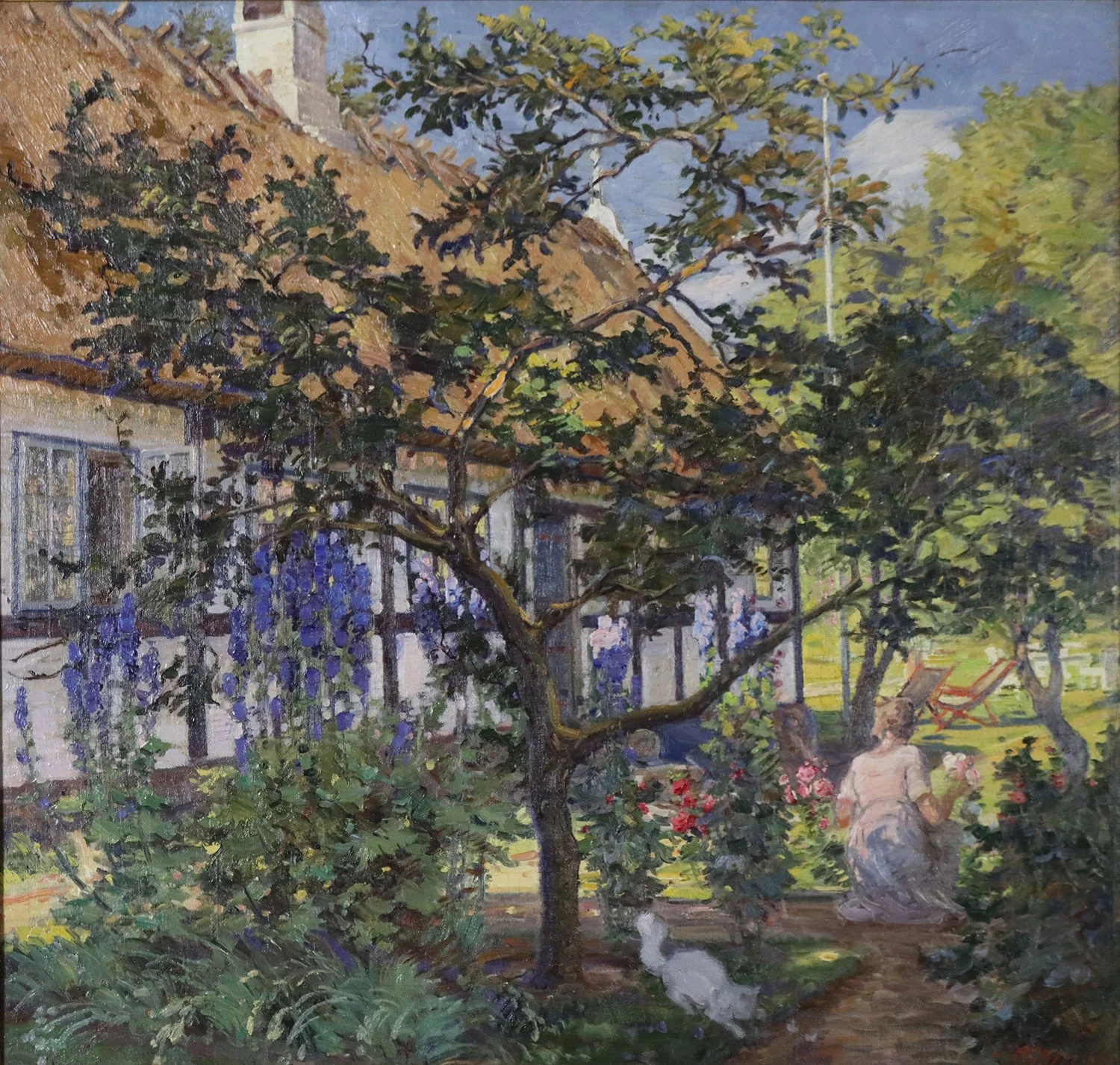 Carl Budtz-Moller (Danish 1882-1953) 'An Afternoon in the Garden at Melsted with Cat'