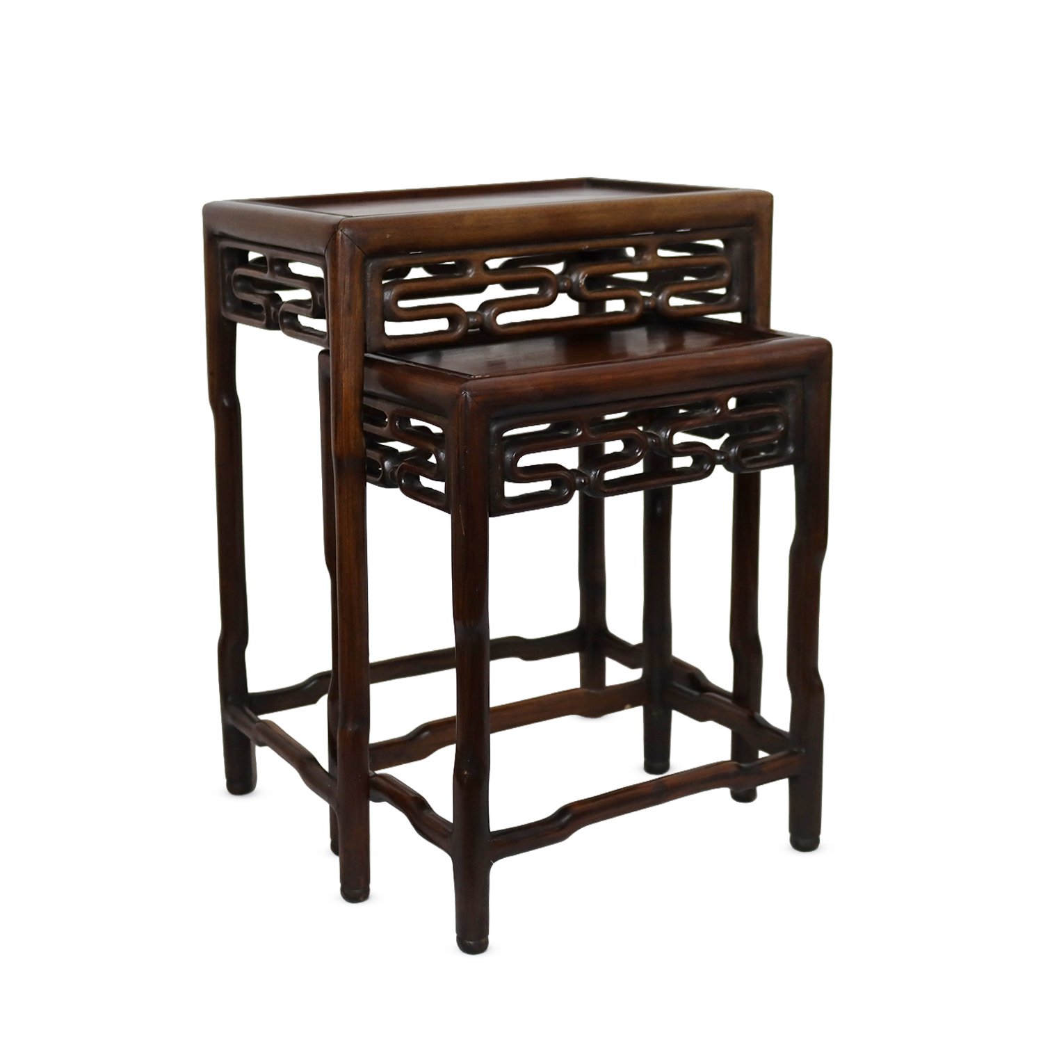 Chinese carved nest of two rectangular tables with carved geometric openwork design, 1900-1920