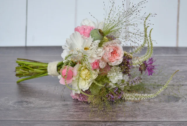 Wedding bouquet with Evelyn and Bonica rose, Dahlia, Cosmos, Scabious, Verbena, Veronicastrum and grasses