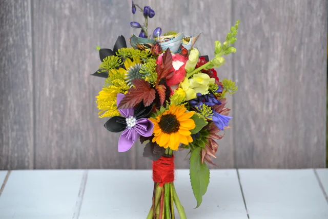 Primary colours bouquet with sunflowers, solidago, agapanthus, antirrhinums, Nostalgia rose, Dill, Echinops and Mondarda. (and paper flowers)