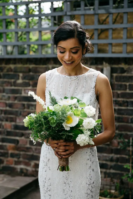 Amita in garden with bouquet 2.jpg