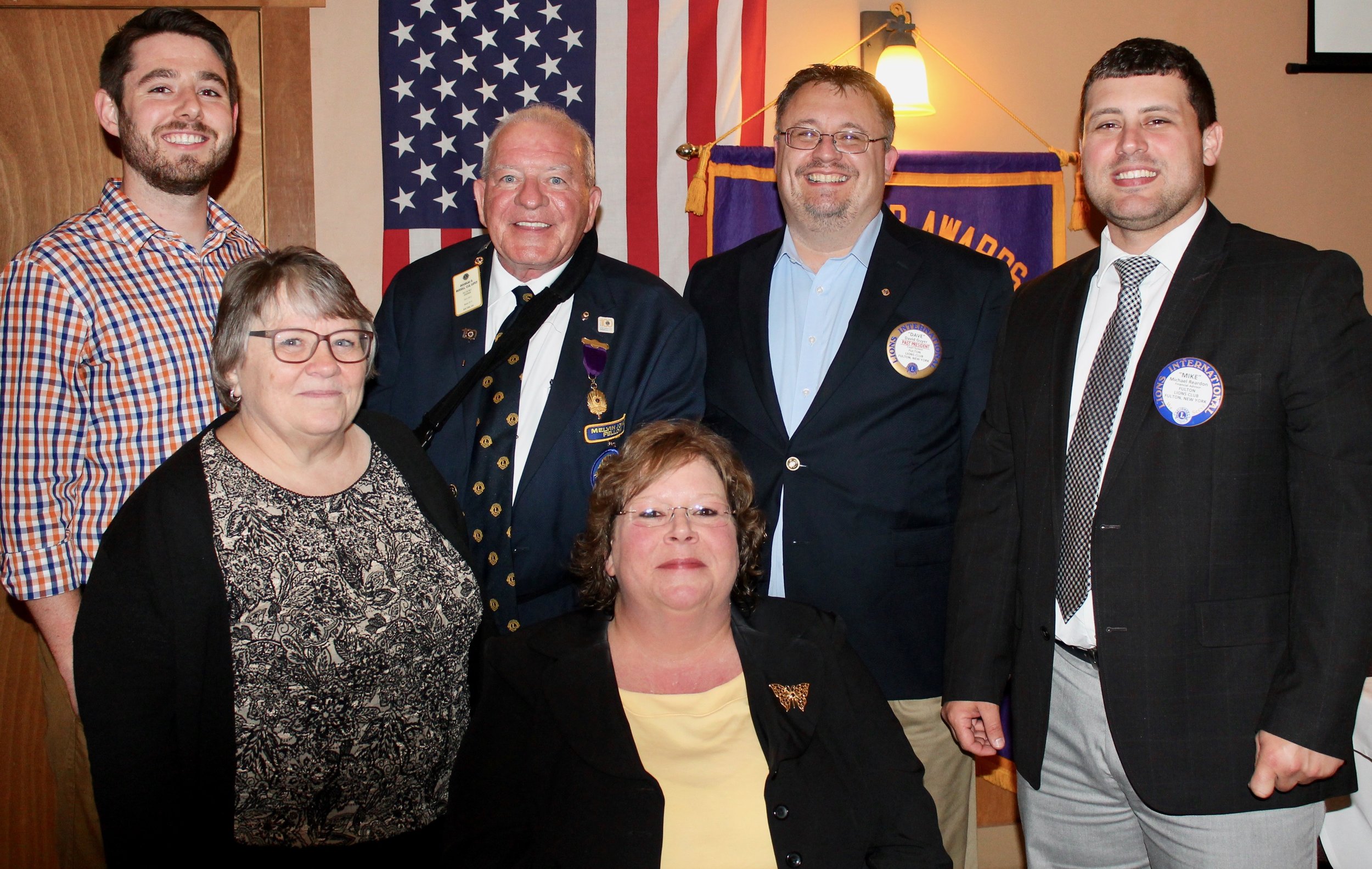 The Fulton Lions Club installed its new slate of officers for 2017-18 and presented club awards for the 2016-17-club year at their June 15 meeting. Michelle Stanard, seated, is president and from left, standing: Zachary Merry, vice president; Linda Hughes, secretary; Lion Douglas G. Russell of Liverpool, past district governor, zone 20-Y1, who presided over the installation; David Guyer, immediate past president; and Michael Reardon, treasurer.