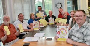 Lions gathered recently to prepare for the event, from left: Bob Weston, Paul Foster, Gail Holmes, Zach Merry, immediate past president; Ron Browning, assistant treasurer; David Dingman, Dennis Rupert, Susan Daratt, treasurer and David Guyer, club president and event chair.