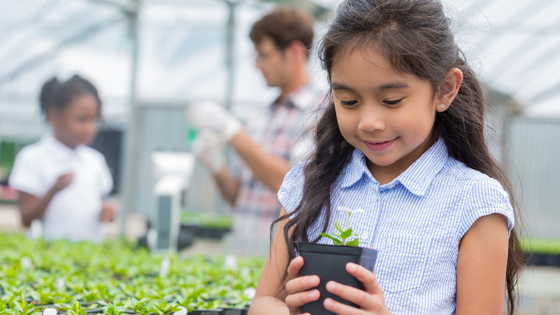 Girl and plant_542203668_smaller.jpg