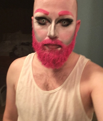 The finished face. I threw in some contacts, matching eyebrows, dark eyes with top and bottom lashes, and a blended red/black lip. Most people with dark or hairy brows have to cover their brows. This is a rare instance when I'm glad I have very little eyebrows.
