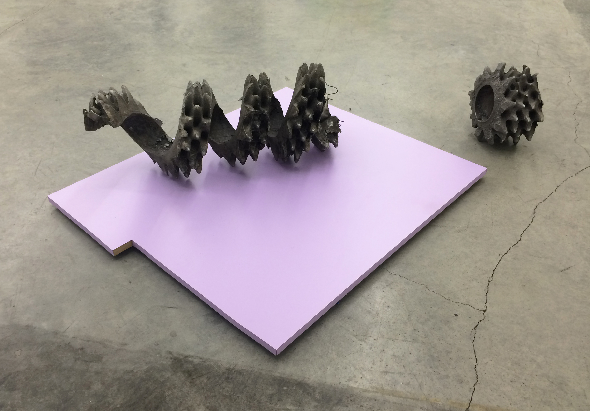   NEVINE MAHMOUD   Ravel (in two parts) with Color Plane Lilac , 2015, cast aluminum, MDF, laminate, 37" x 31" x 12" and 10" x 10" x 6" 