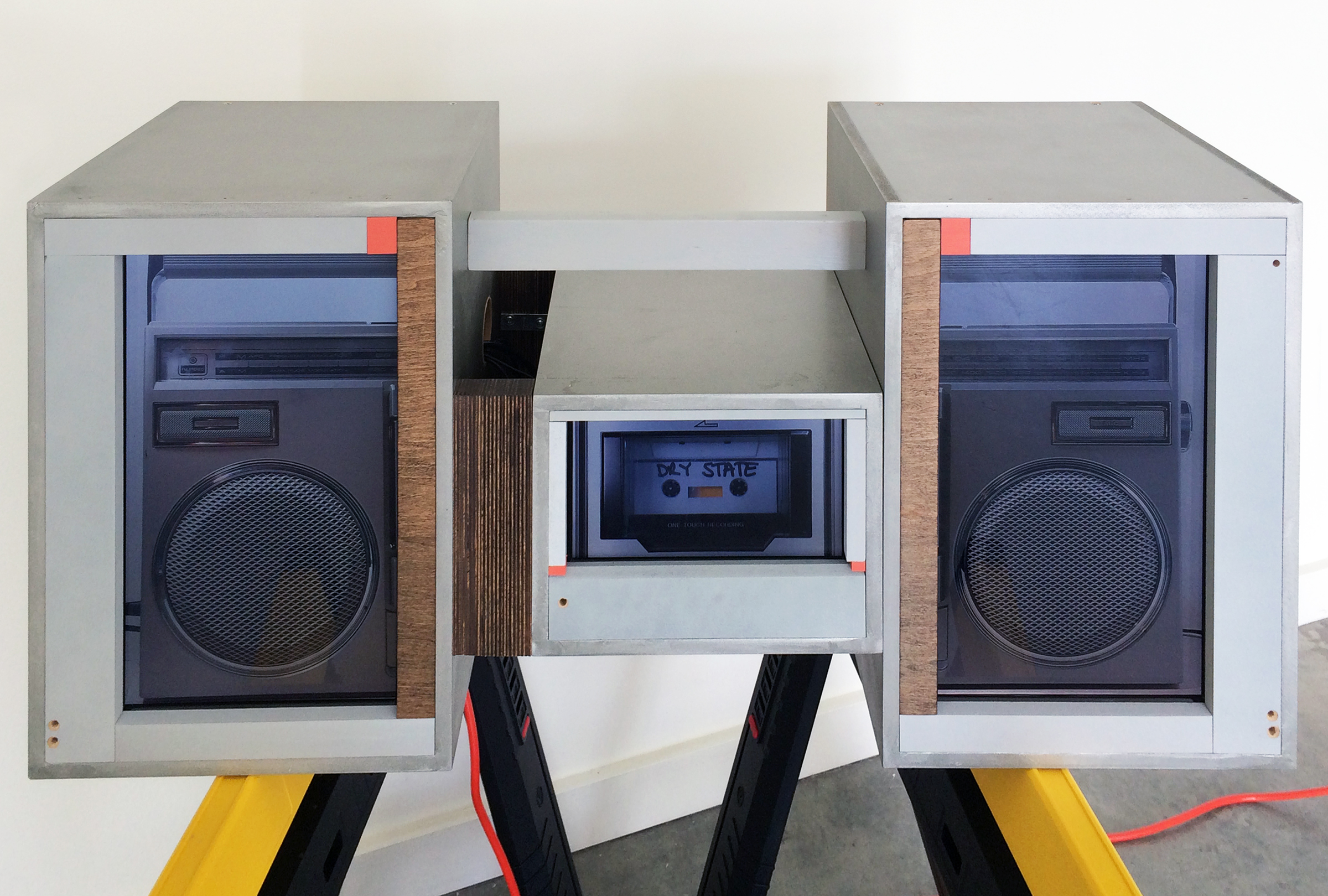   JOSHUA PIEPER   Video Boom Box , 2015, LCD monitors, dvds, speakers, wood housing and saw horses, 46.75" x 35.75" x 10" 