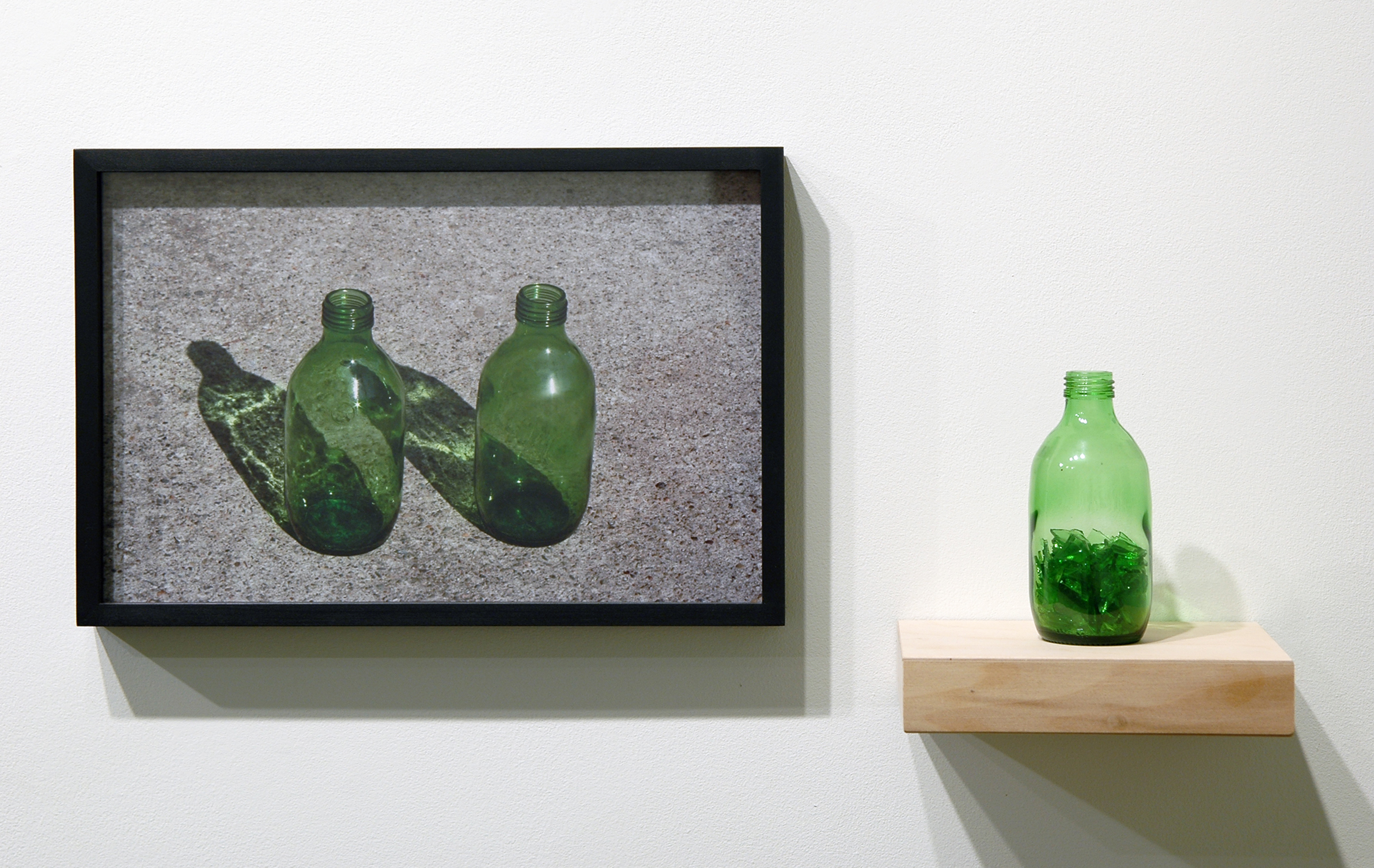   WITH CINDER BLOCKS WE FLATTEN OUR PHOTOGRAPHS  Pablo Guardiola,&nbsp; Untitled , c-print, glass bottle, broken glass and shelf, 26" x 12.5" x 6", 2013 