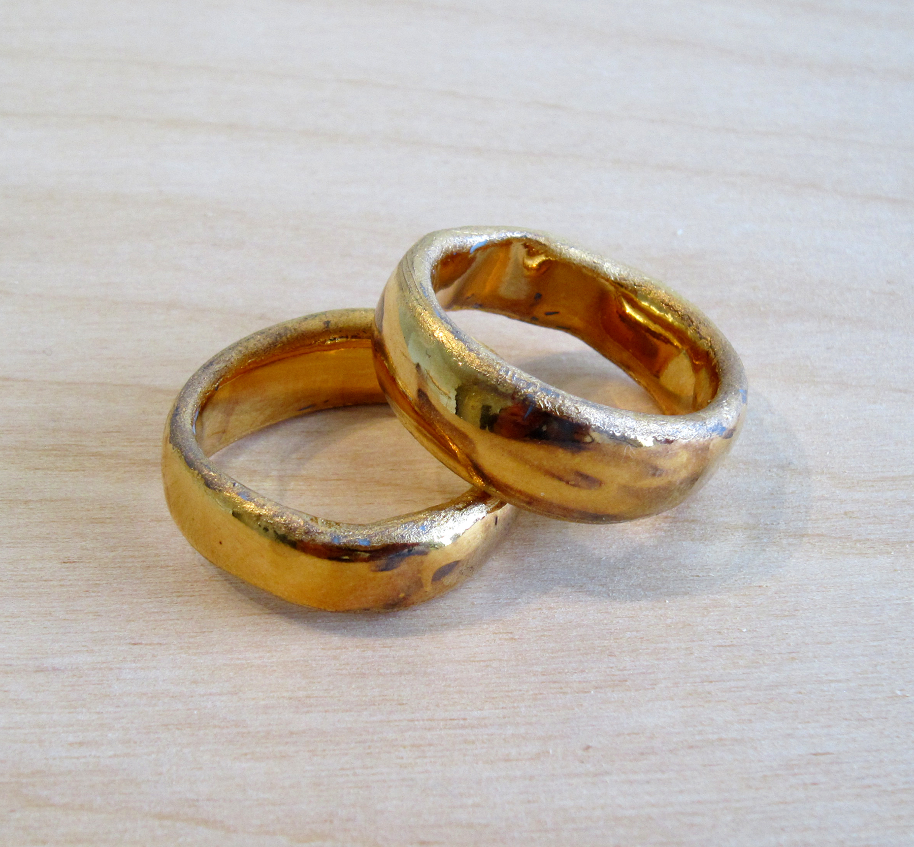 ERIK SCOLLON A Theory of Love, 2013, gold luster on porcelain, 1 1/2" circumference (each