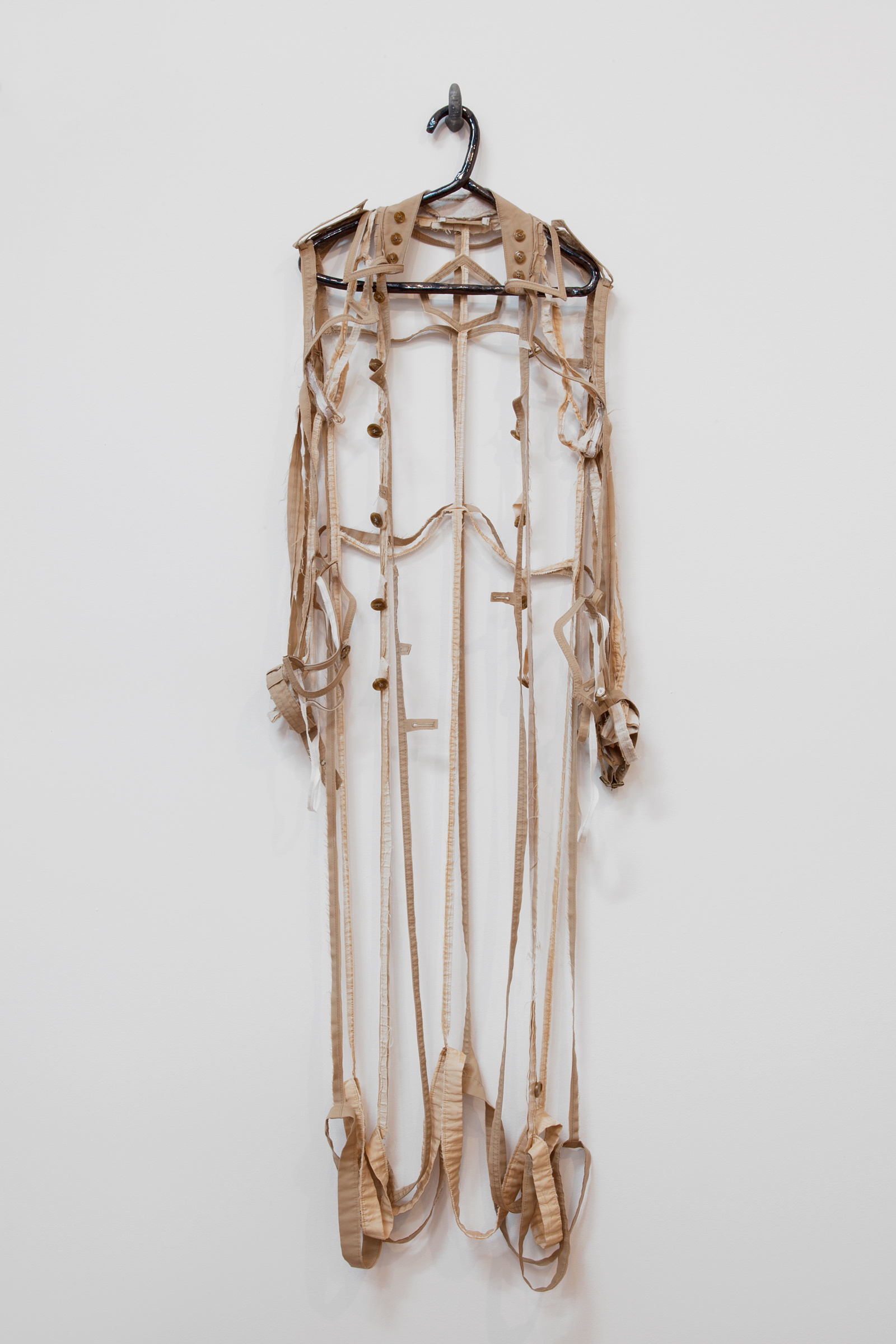   ANNA SEW HOY   beige/tan , fired stoneware, trench coat and resin finger hook, 62.5" x 17" x 4", 2012 