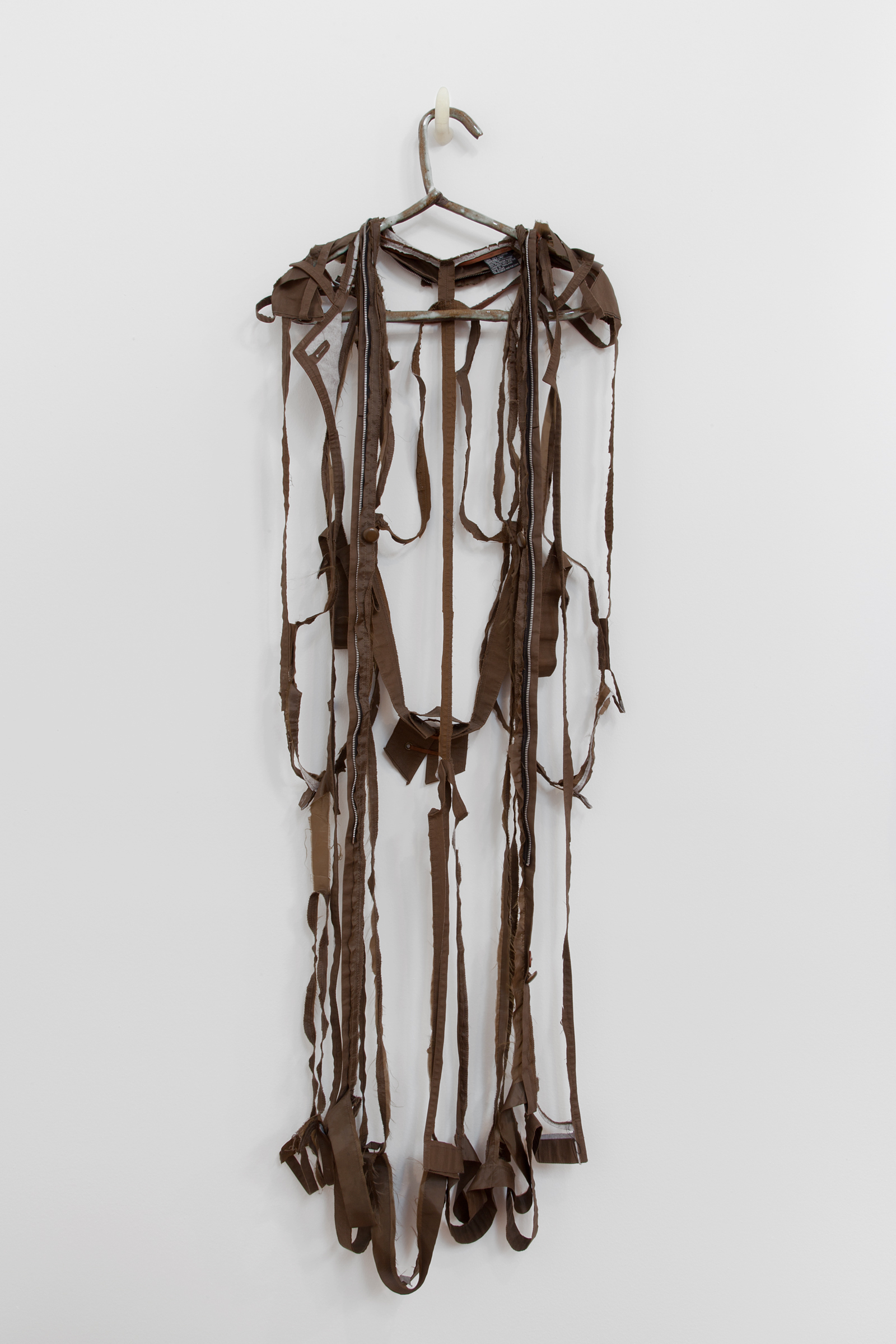   ANNA SEW HOY   chocolate/chocolat , fired stoneware, trench coat and resin finger hook, 58.5" x 18" x 3.5", 2012 