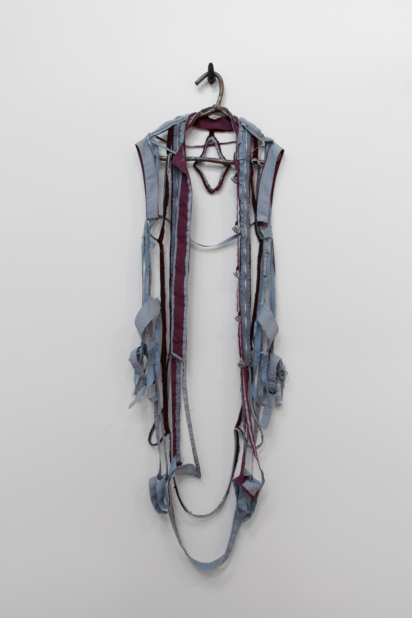   ANNA SEW HOY   maroon/bleu lavande , fired stoneware, trench coat and resin finger hook, 58" x 18" x 4.5", 2012 