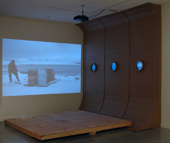 CHAD STAYROOK The Search for the unattainable beast... , digital projector, LCD monitors, DVD players, cardborad and wood 120" x 120 x 120", 2010