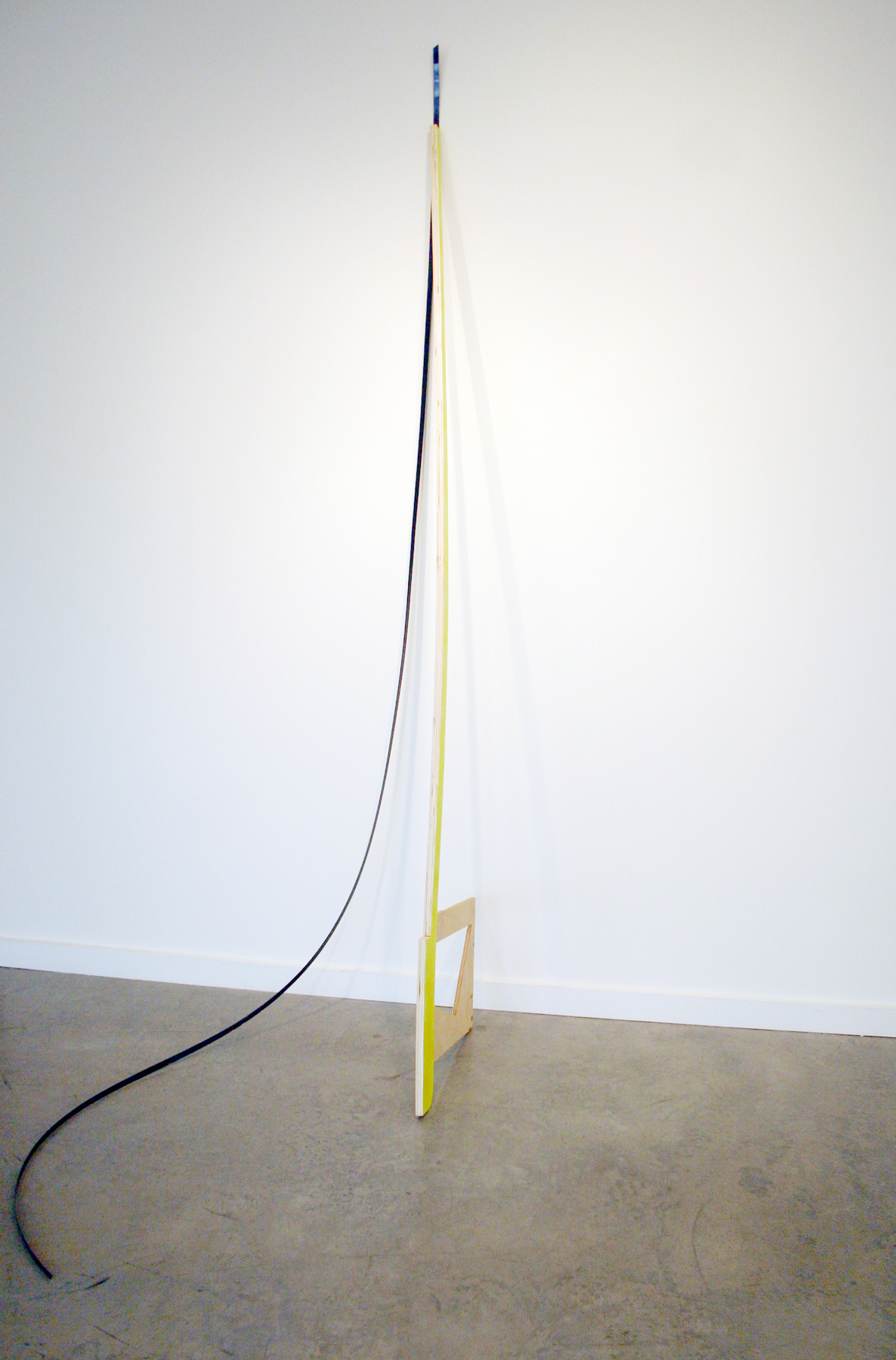   KIRK STOLLER   Untitled (bow),&nbsp; wood, paint and black strapping, 101" x 35" x 53.5", 2011 